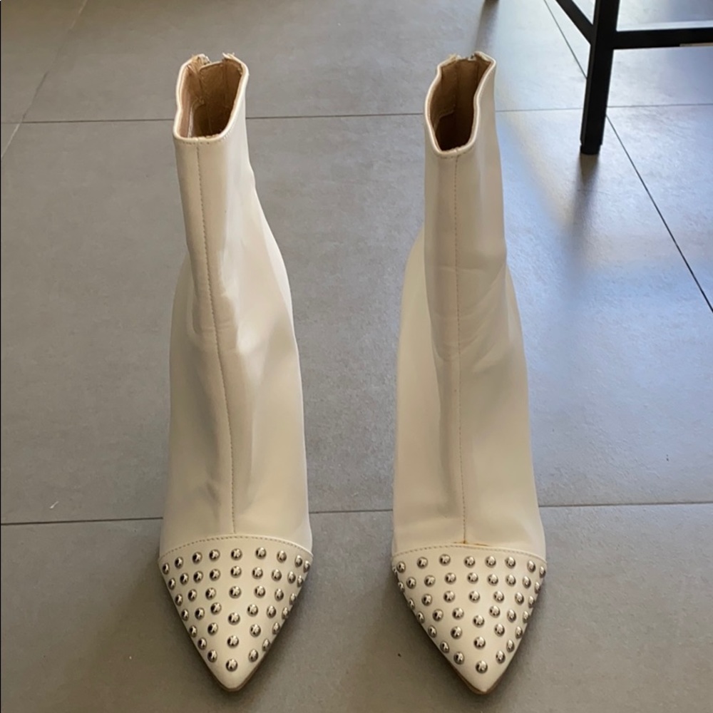 White booties with stud accent